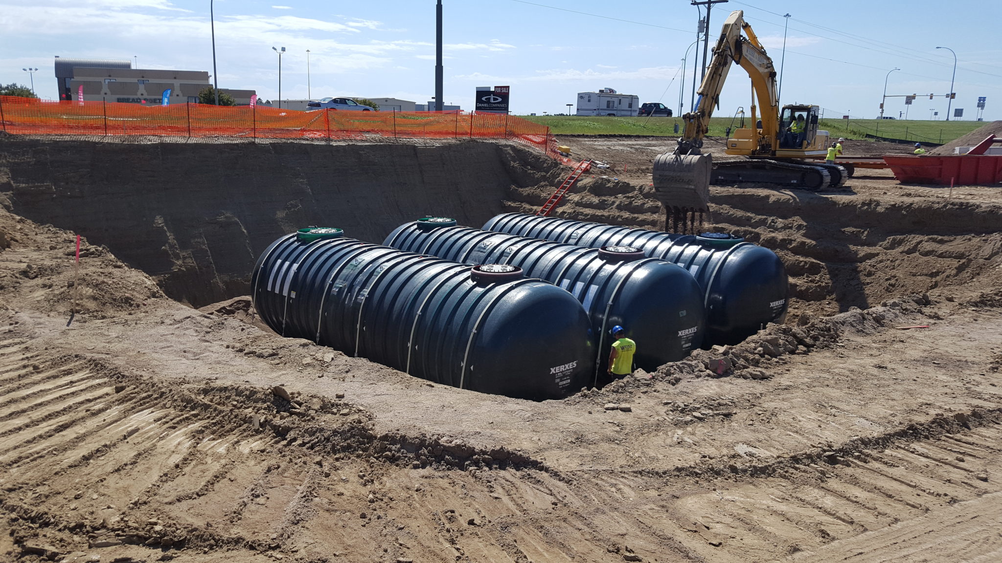 Tanks in ground with construction